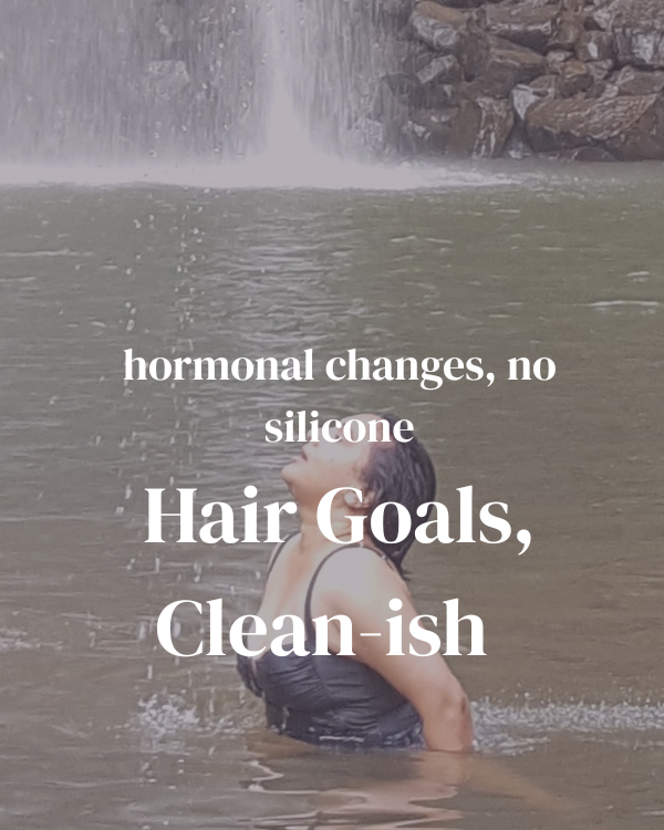 Founder Cetana Das at Milla Milla Falls in Queensland, doing a mermaid hair flick to represent Conscious Glow’s clean hair care philosophy.